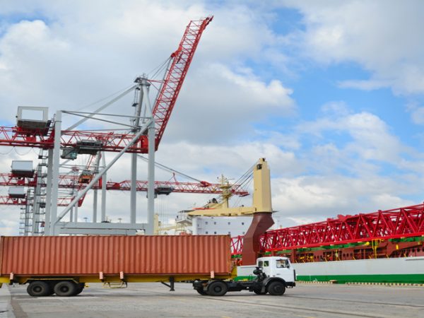 Shipping and cargo Truck in container terminal in a harbor